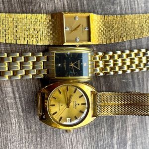 Three men’s watches.  A Whitnaer, a Gruen and a Stellarus.